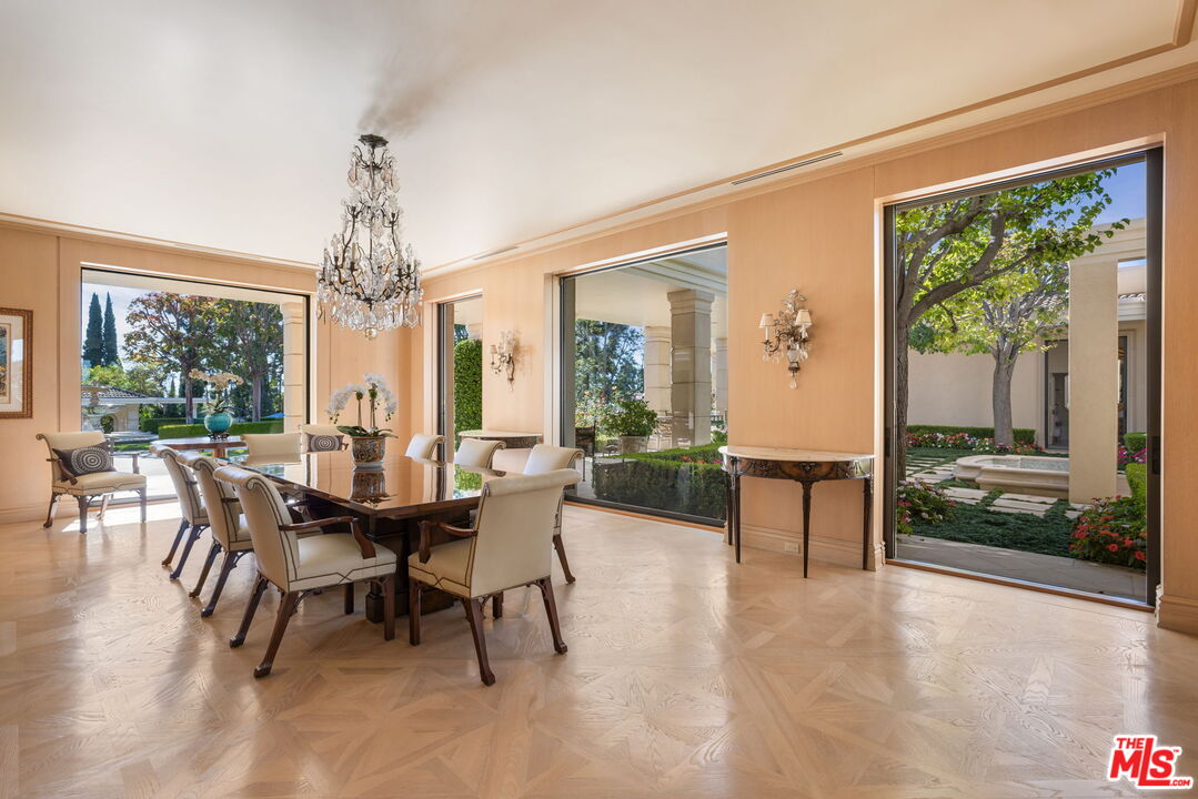 400 St Cloud Road Los Angeles, CA 90077 - Photo 14 of 25 a view of a dining room with furniture window and outside view