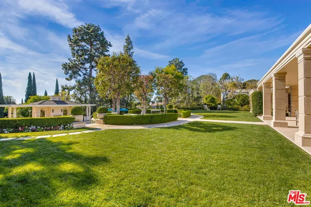 a view of a house with a big yard