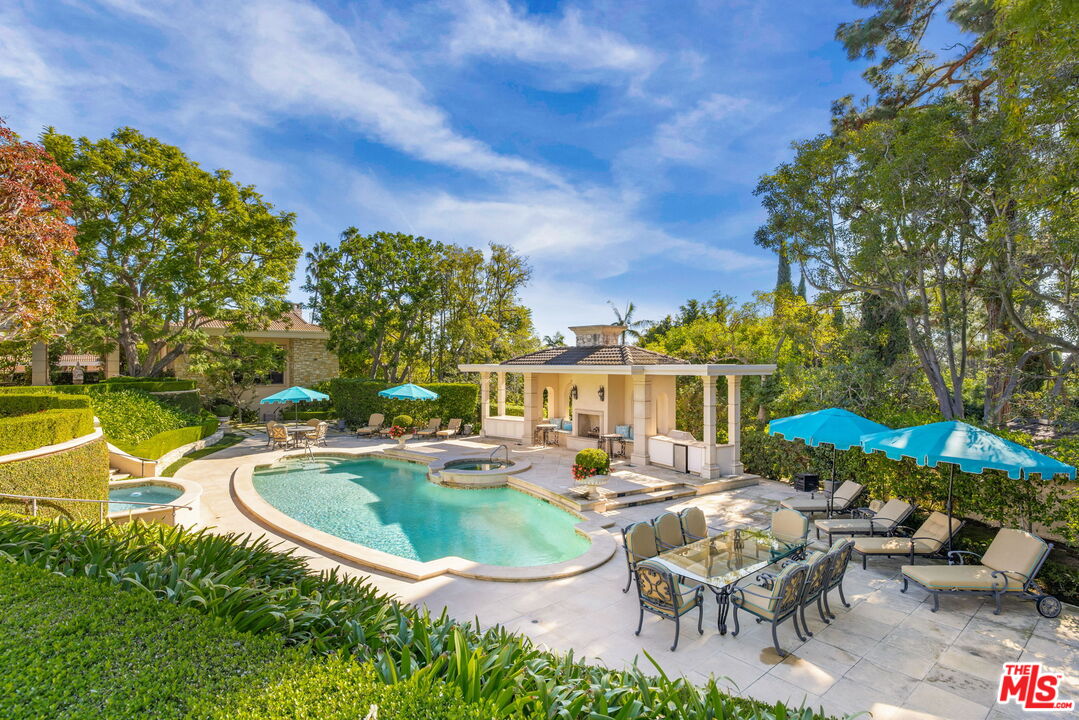 400 St Cloud Road Los Angeles, CA 90077 - Photo 5 of 25 swimming pool view with a seating space
