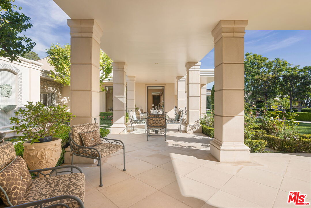 400 St Cloud Road Los Angeles, CA 90077 - Photo 8 of 25 a building outdoor space with patio furniture