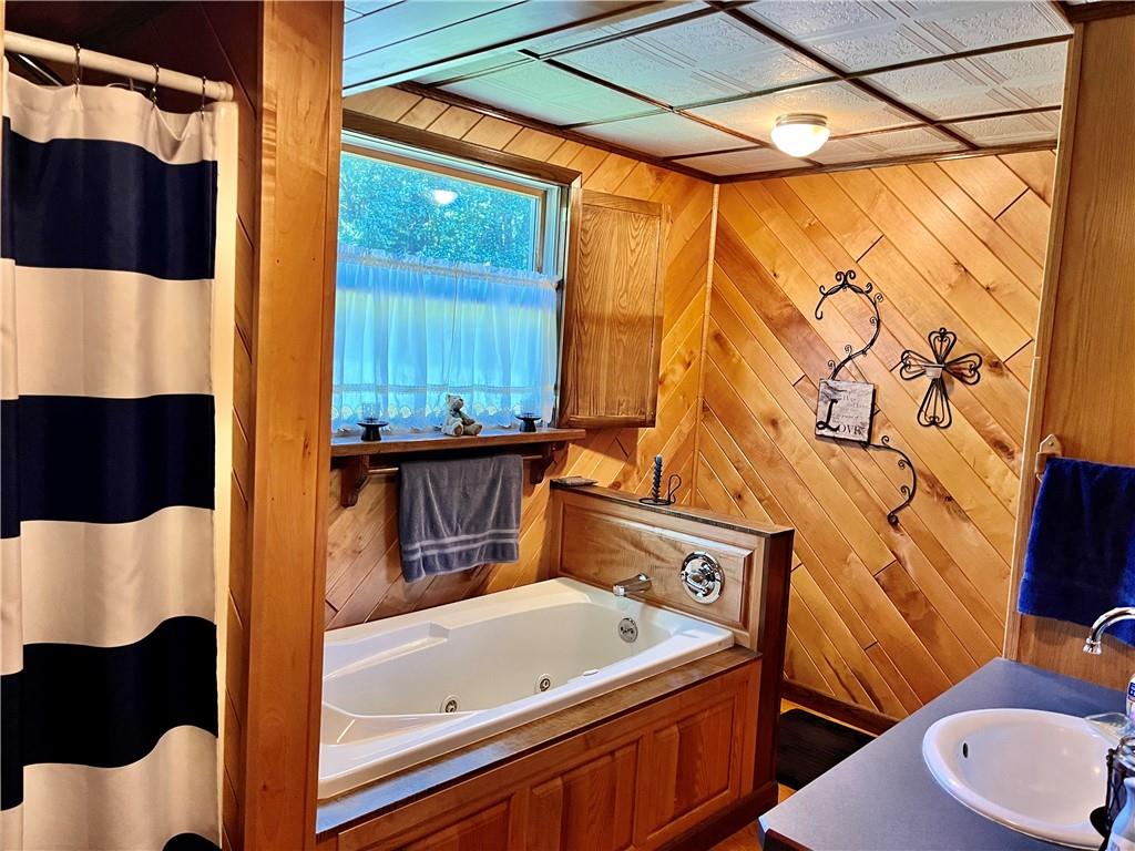 1316 Chicora Road Chicora, PA 16025 - Photo 14 of 25 a bathroom with a bathtub and shower