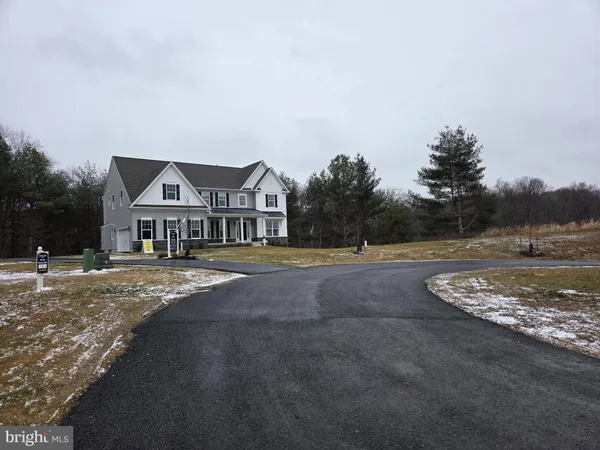 a view of house with outdoor space and street view