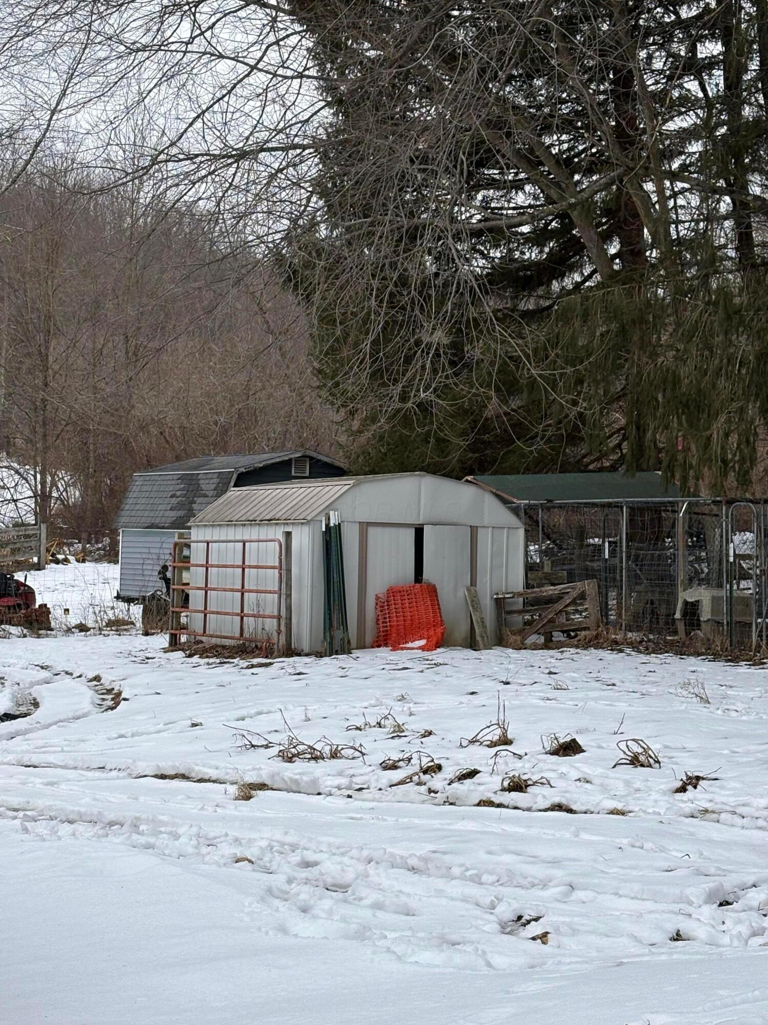12117 Techniglas Road St. Louisville, OH 43071 - Photo 30 of 38 shed stays, kennels do not stay