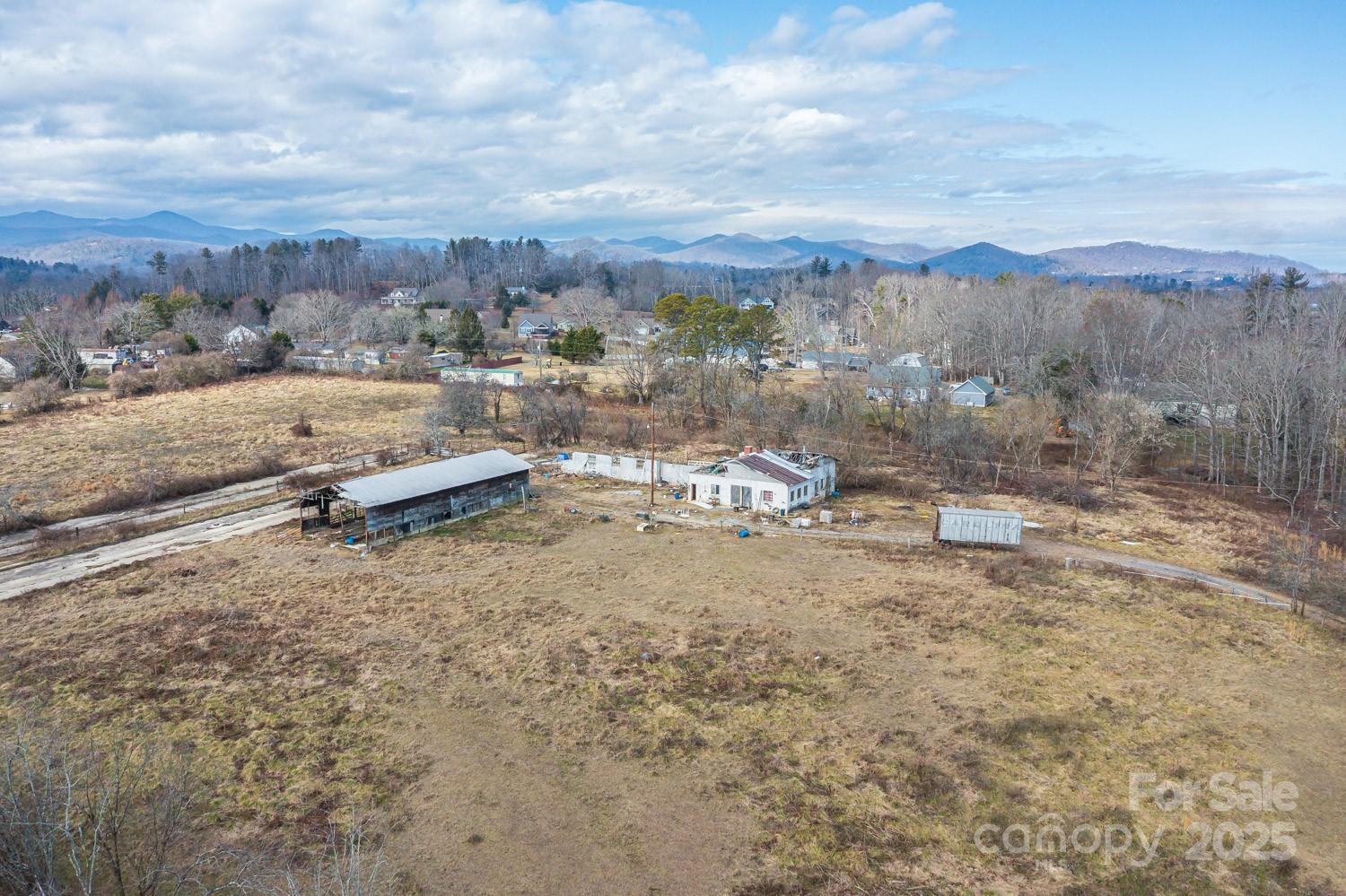 0 Ladson Road Horse Shoe, NC 28742 - Photo 5 of 11 a view of a dry yard with wooden fence
