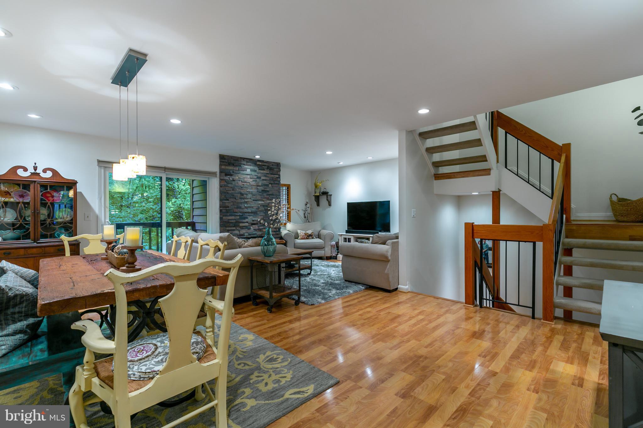 1960 Winterport Cluster Reston, VA 20191 - Photo 2 of 29 a view of a dining room with furniture window and outside view