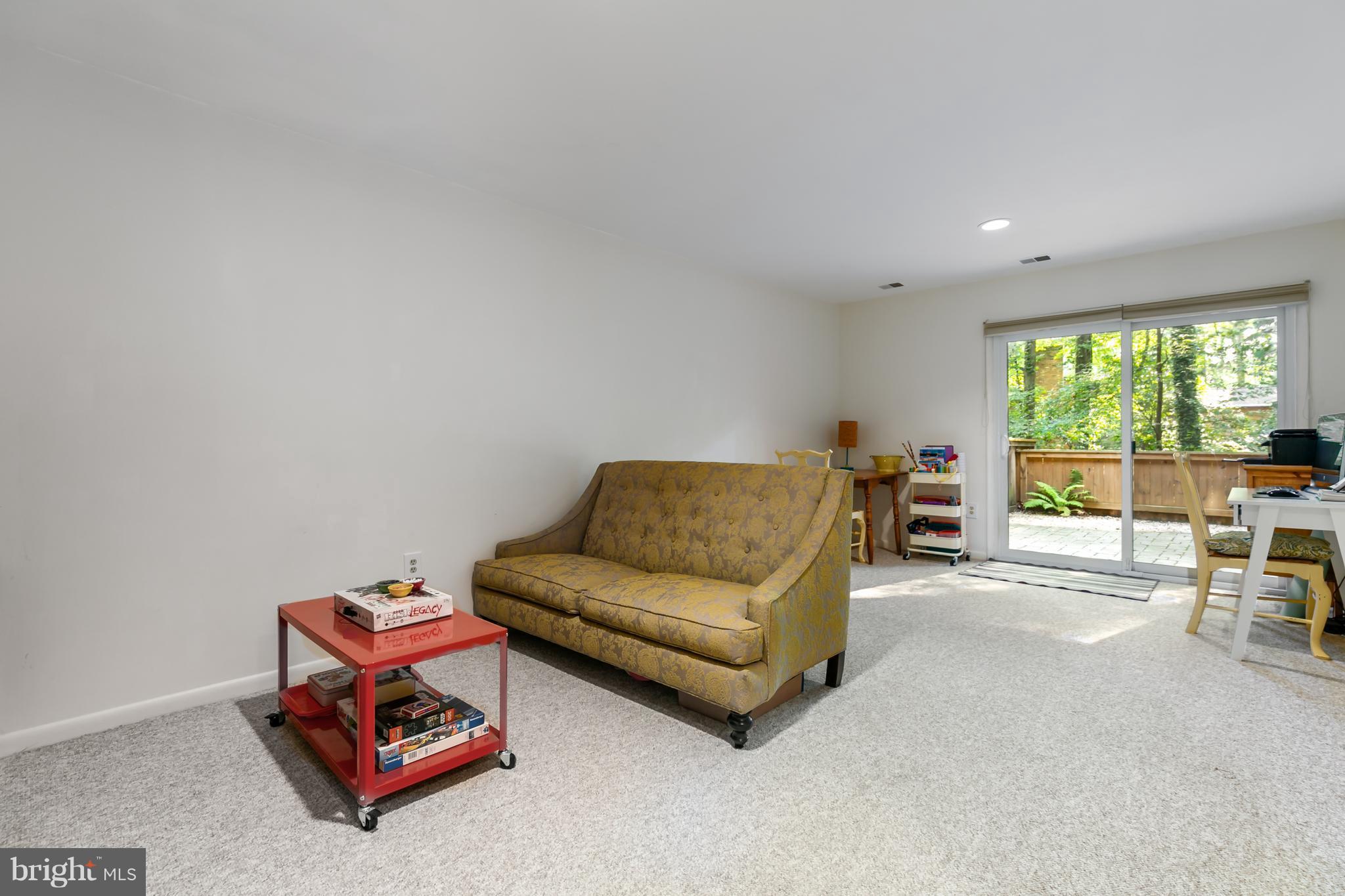 1960 Winterport Cluster Reston, VA 20191 - Photo 17 of 29 a living room with furniture and a large window