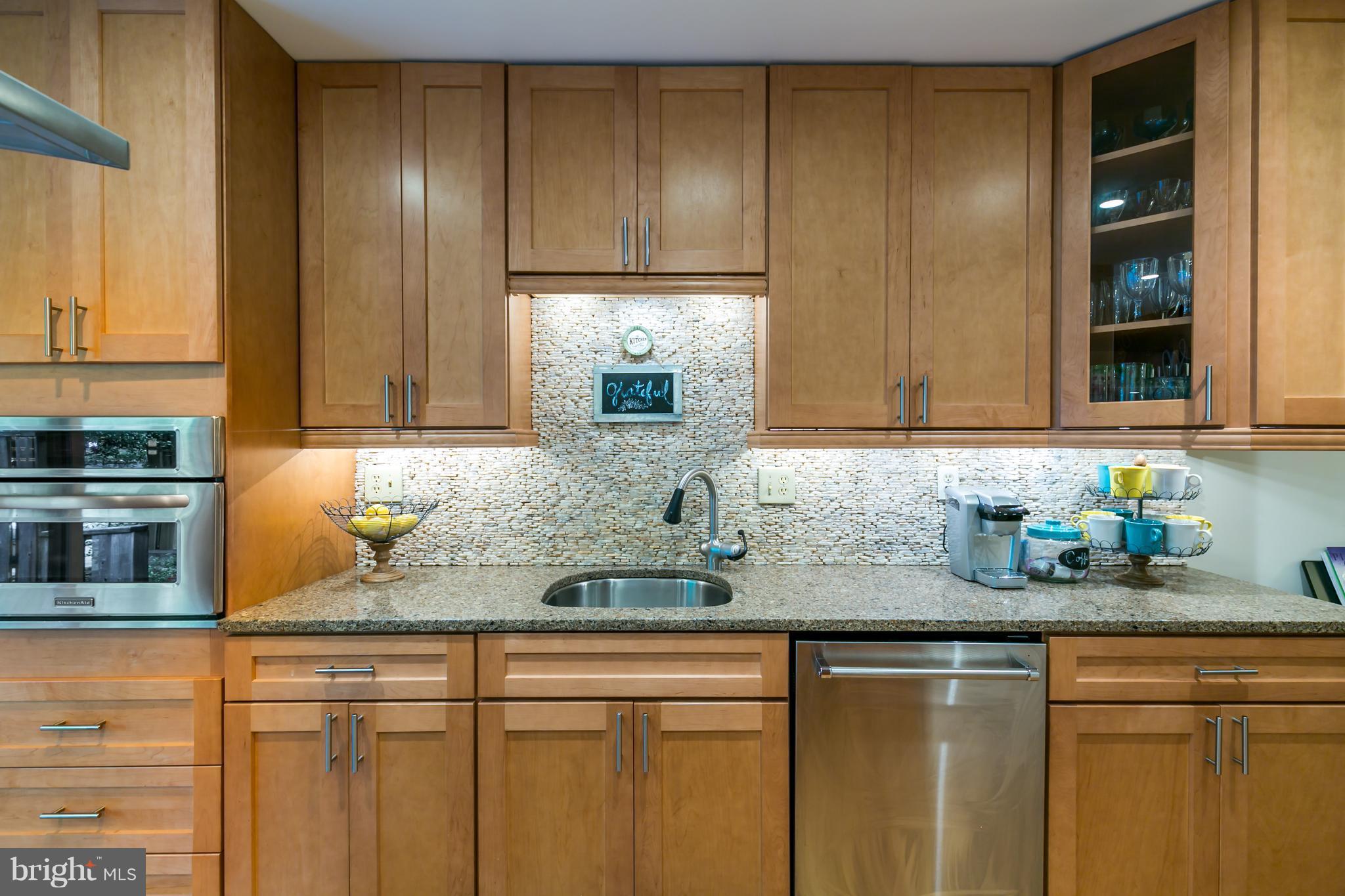 1960 Winterport Cluster Reston, VA 20191 - Photo 6 of 29 a kitchen with a sink cabinets and window