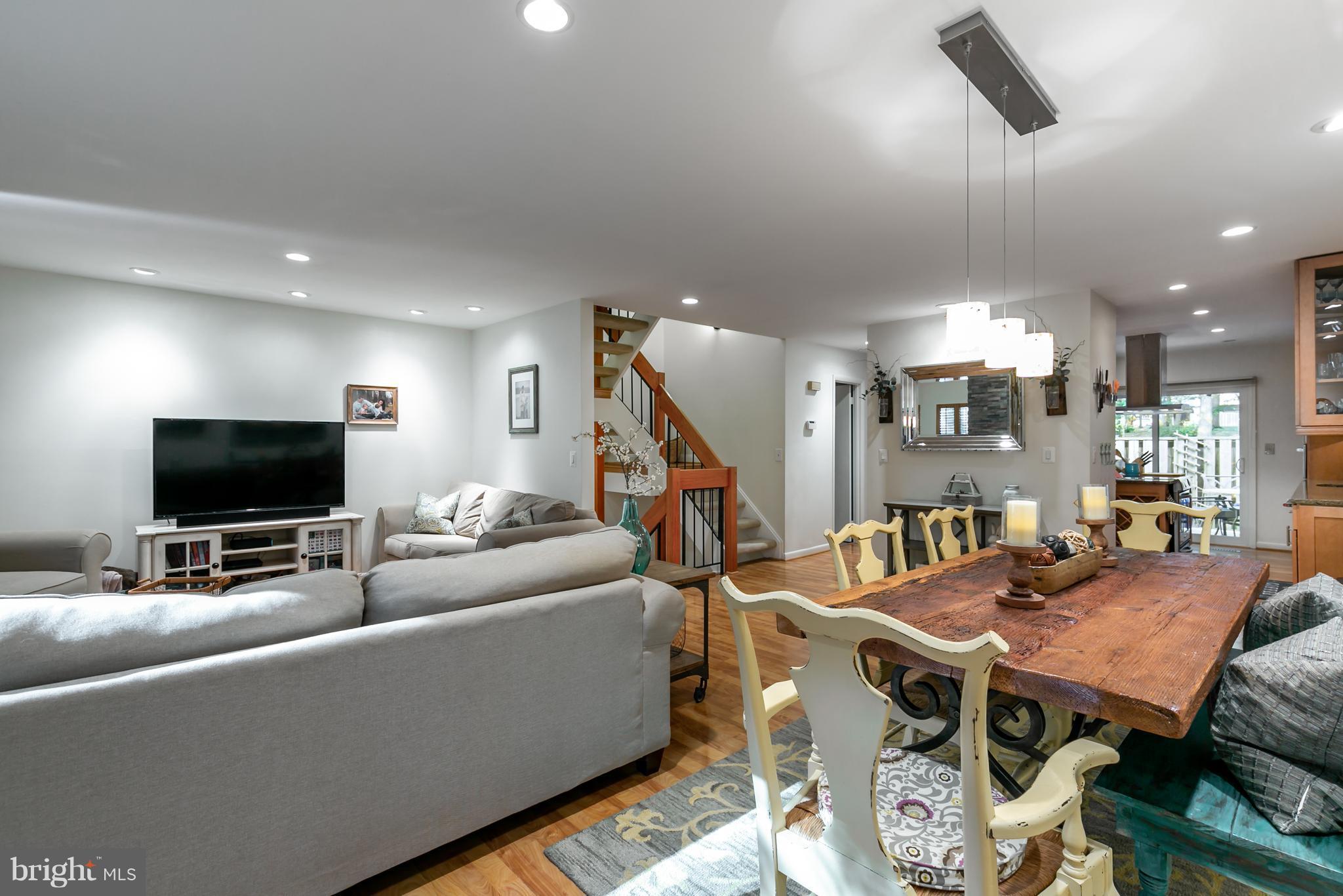 1960 Winterport Cluster Reston, VA 20191 - Photo 8 of 29 a living room with furniture and a flat screen tv