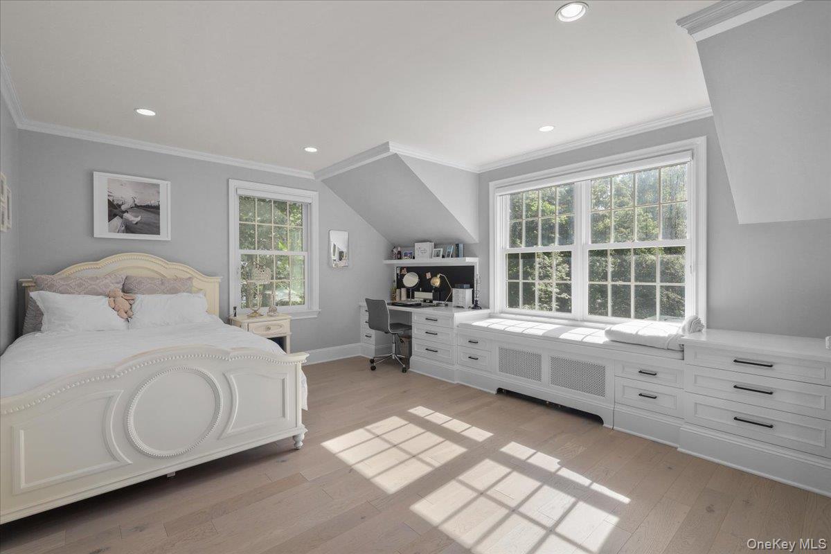 135 Pines Bridge Road Katonah, NY 10536 - Photo 24 of 40 a room with a bed and a large window