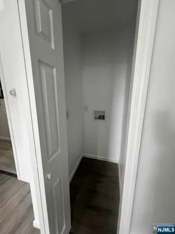 a view of a building with a yard