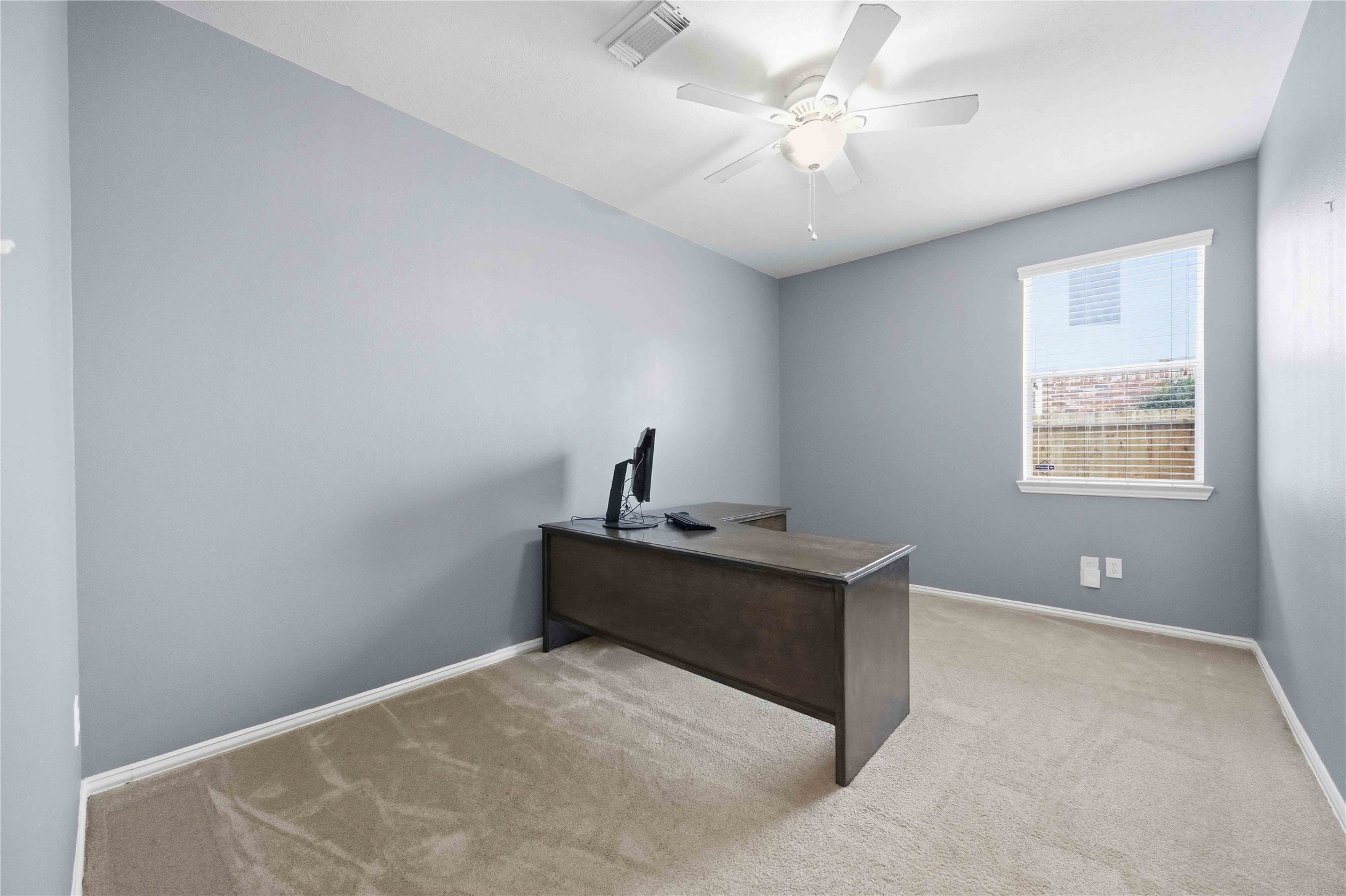 803 Northridge Terrace Lane Spring, TX 77373 - Photo 19 of 42 a room with chandelier fan and windows