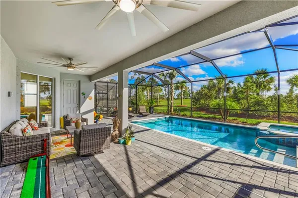 a living room with couch and a table