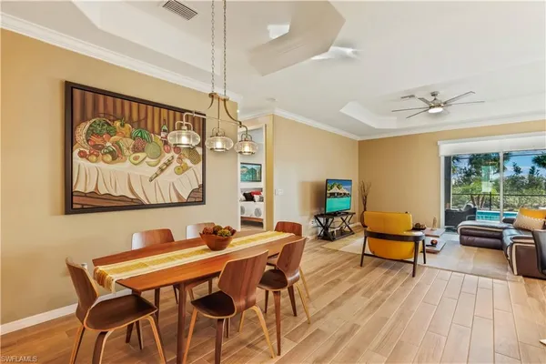 a view of a dining room with furniture window and outside view