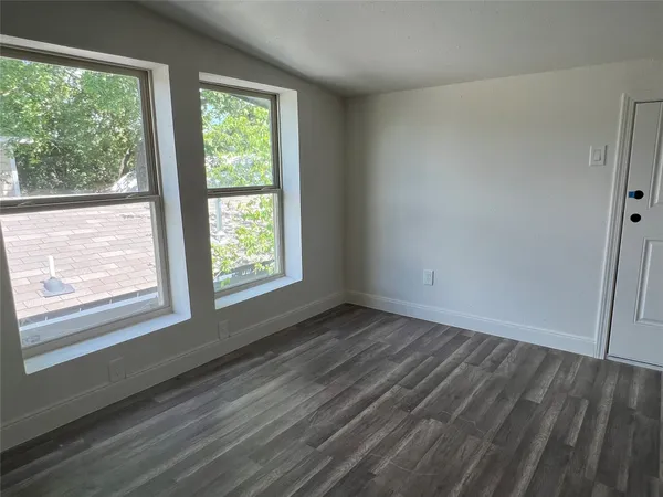 a view of an empty room and window