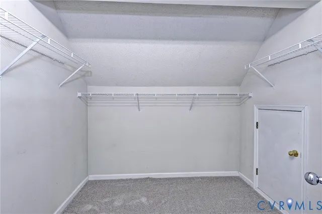 a view of a room with racks on the wall