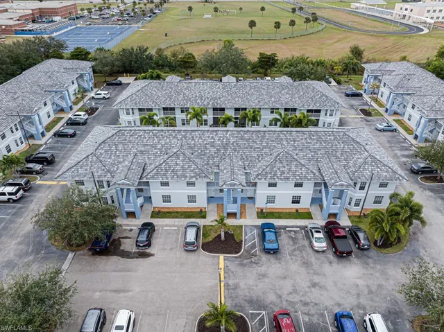 a view of swimming pool with outdoor seating and yard