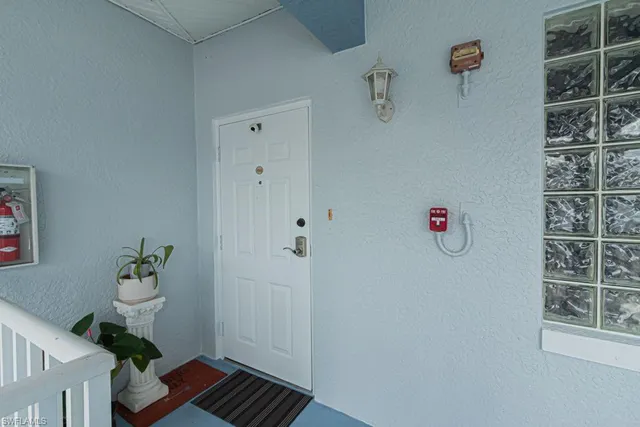 a bathroom with a shower and a toilet