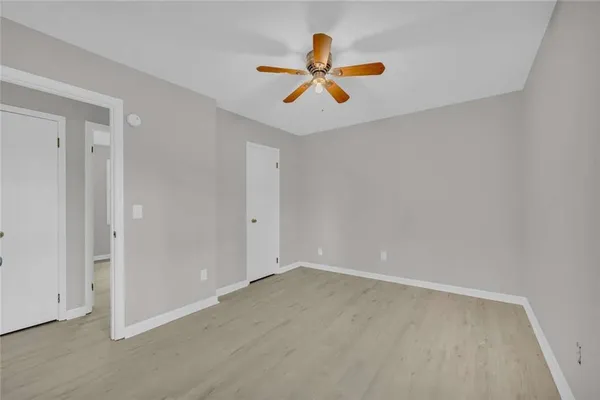 a view of room with ceiling fan