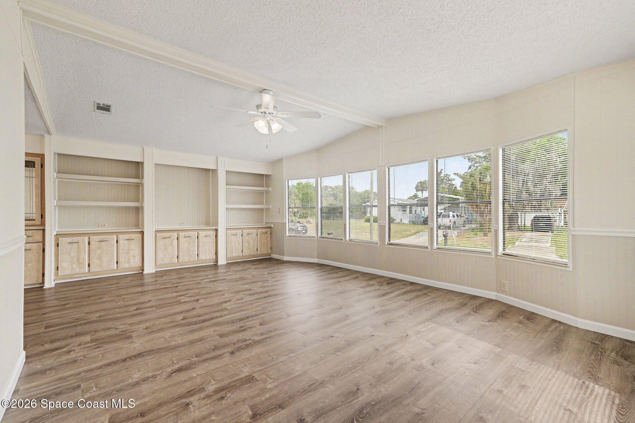 604 Breezeway Drive Cocoa, FL 32926 - Photo 12 of 26 Family Room with more built in cabinetry