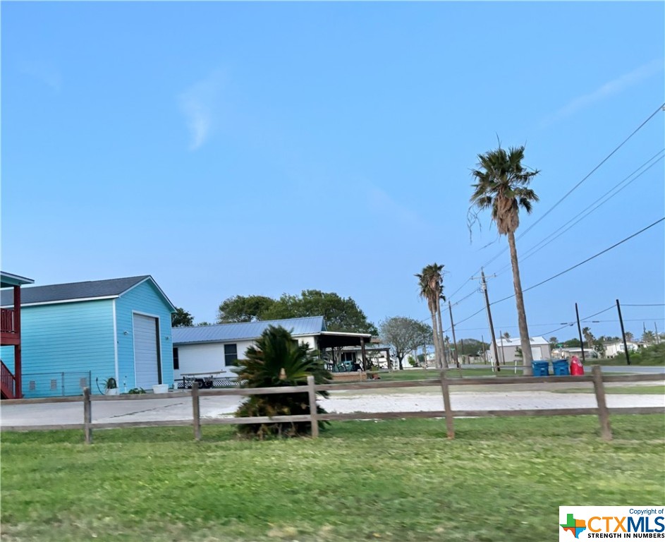 512 West Adams Street Port O'Connor, TX 77982 - Photo 21 of 27 a park with table and chairs