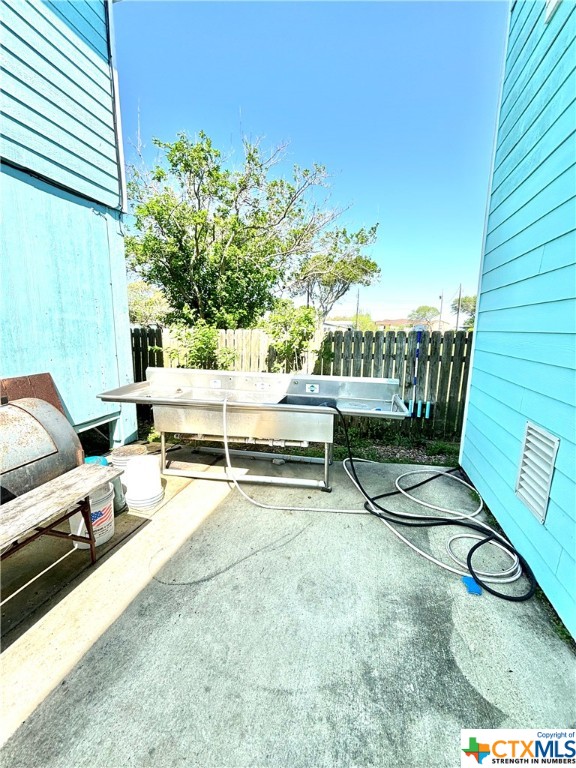 512 West Adams Street Port O'Connor, TX 77982 - Photo 24 of 27 a view of a chairs in a patio