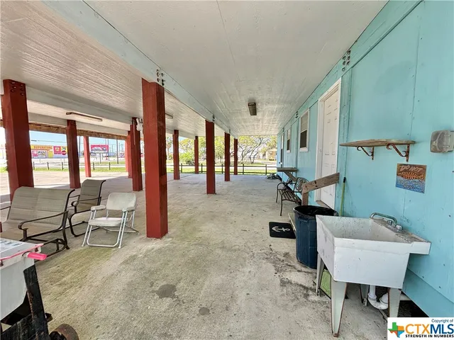 a view of a living room and dining room