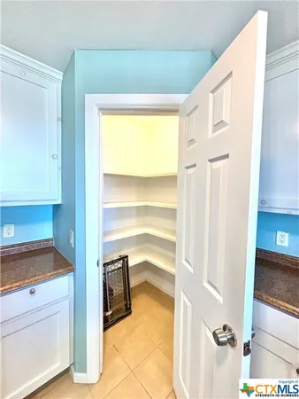 a view of a kitchen with a sink
