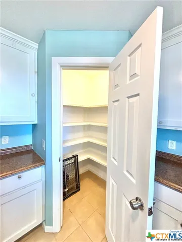 a view of a kitchen with a sink