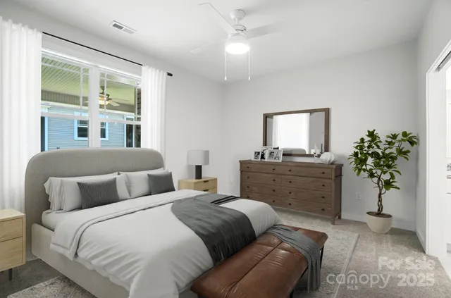 an empty room with windows and entrance