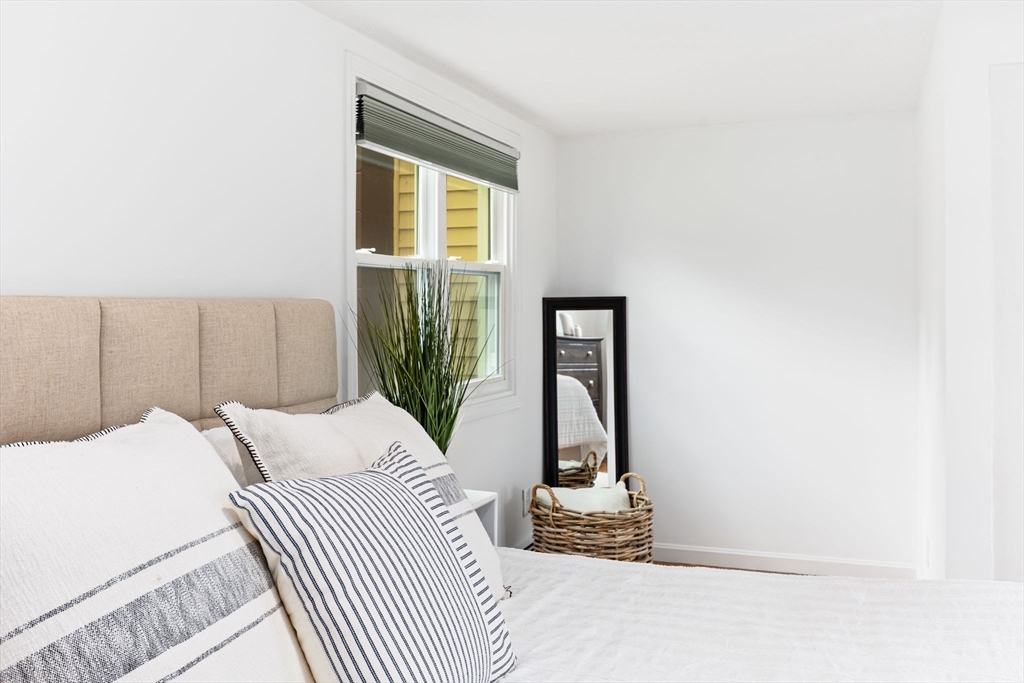 17 Weaver Street Wareham, MA 02576 - Photo 19 of 37 a bedroom with a bed and a window