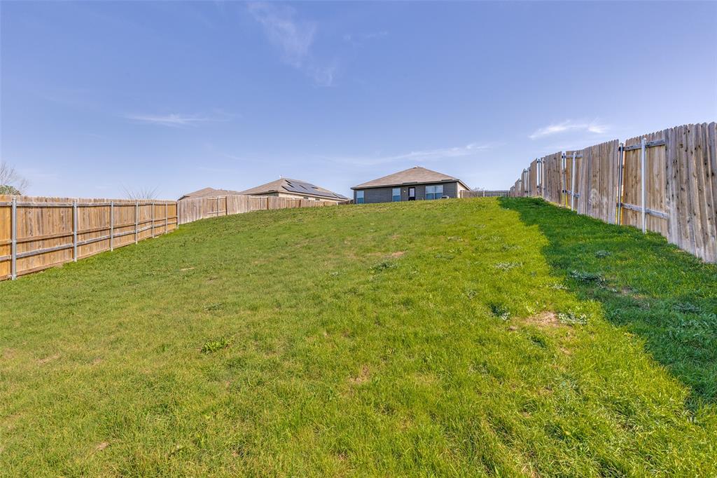 144 Barbwire Way Newark, TX 76071 - Photo 21 of 24 a view of outdoor space and yard