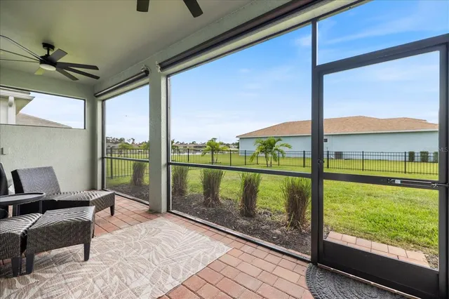 a living room with hardwood floor and city view