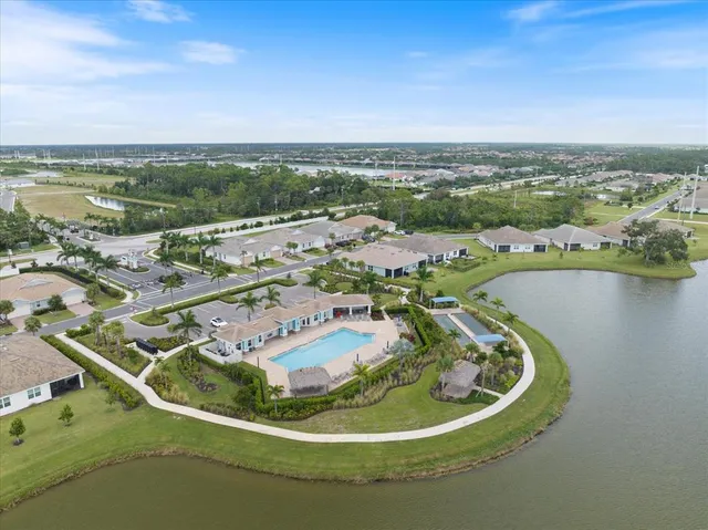 a view of a lake with a big yard