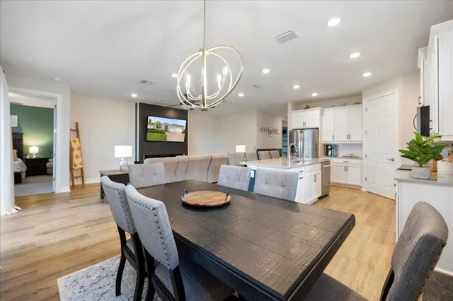 a view of a dining room with furniture