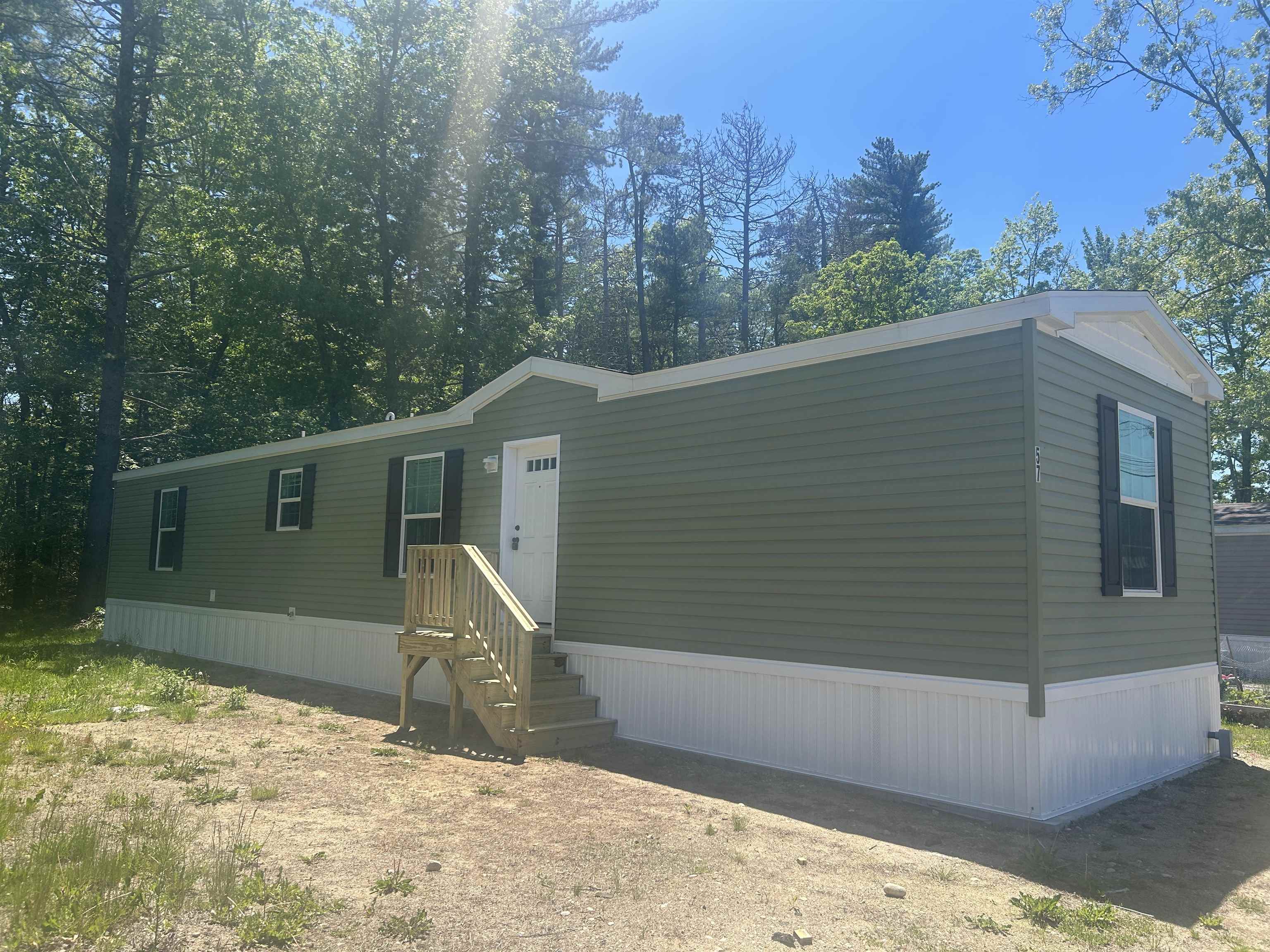 57 Pineland Park Road Milton, NH 03851 - Photo 1 of 15
