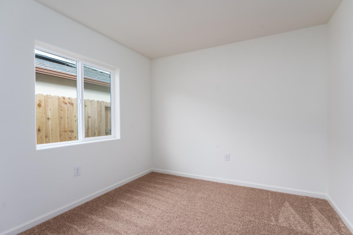 2272 Travis Court Newman, CA 95360 - Photo 11 of 13 an empty room with a window