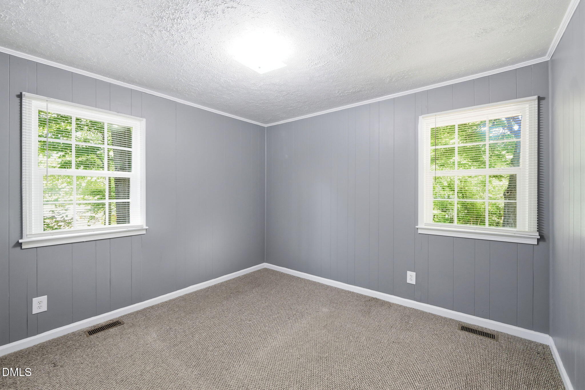 265 Shady Hill Circle Roxboro, NC 27573 - Photo 11 of 18 an empty room with windows