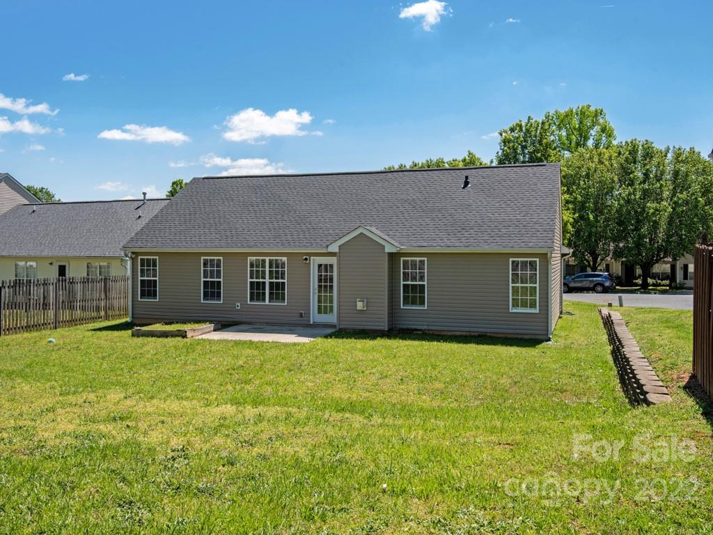 8215 Fox Swamp Road Charlotte, NC 28215 - Photo 21 of 25 a front view of a house with yard