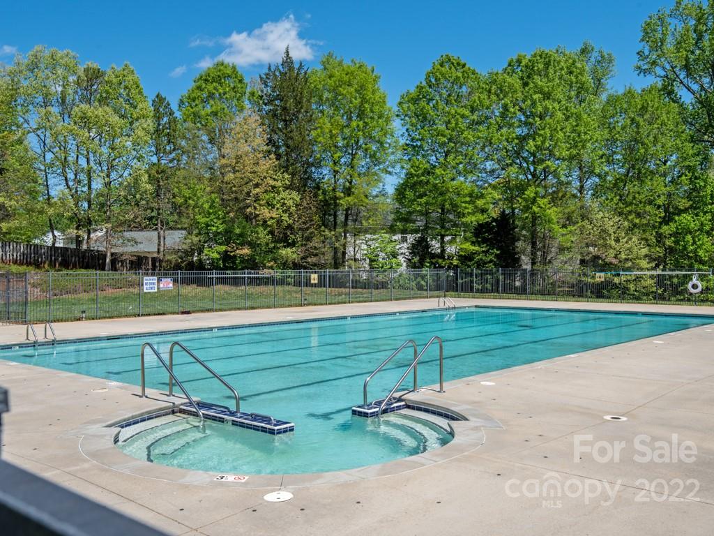 8215 Fox Swamp Road Charlotte, NC 28215 - Photo 24 of 25 a view of a tennis court