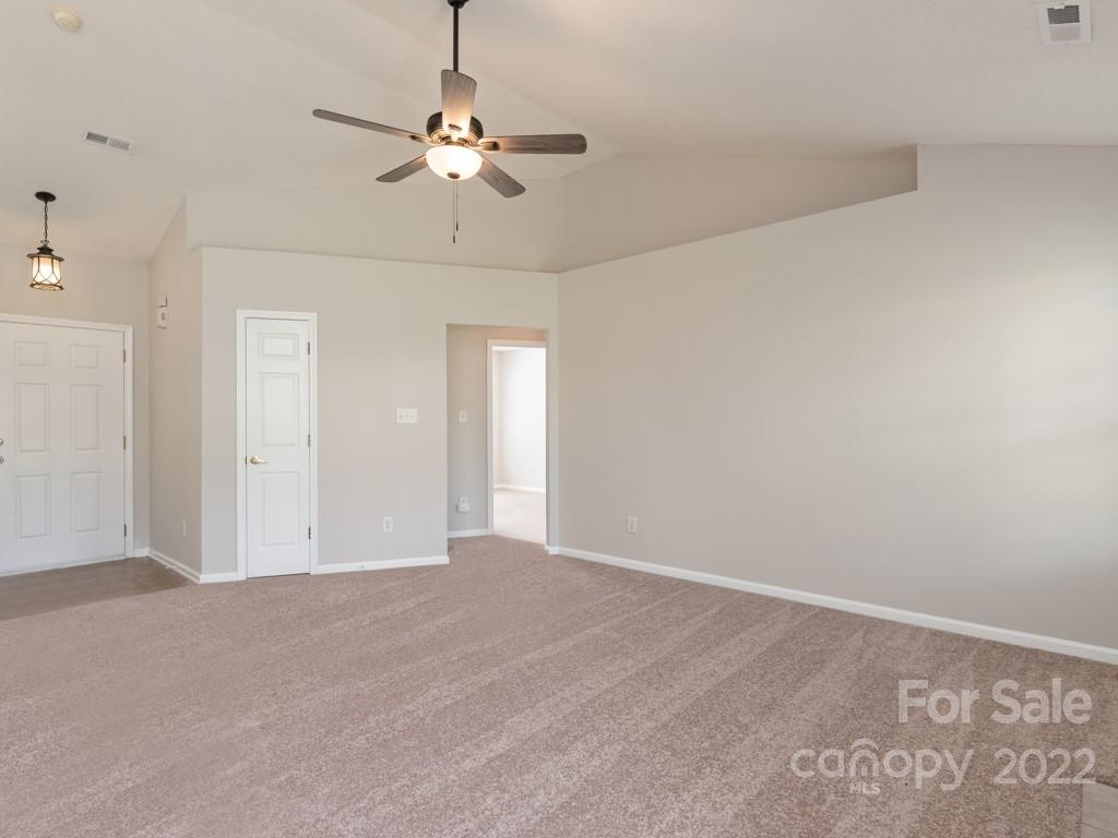8215 Fox Swamp Road Charlotte, NC 28215 - Photo 5 of 25 a view of an empty room with a window