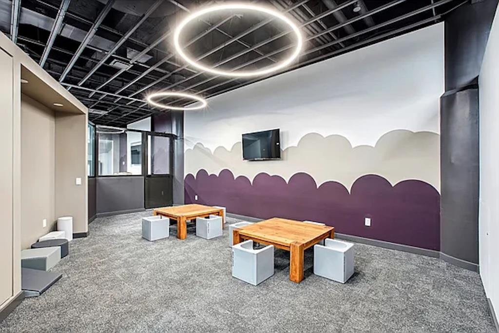 27-28 Thomson Avenue, Unit 804 Queens, NY 11101 - Photo 16 of 17 a view of a chairs and table in a room