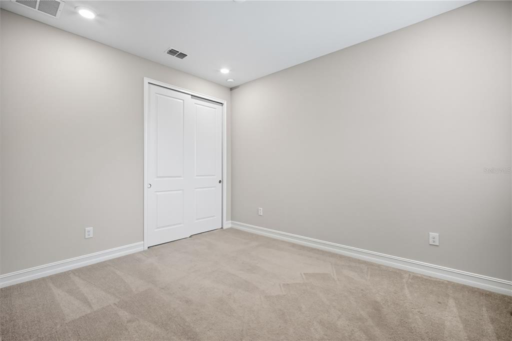 4663 Almada Lane Wesley Chapel, FL 33543 - Photo 15 of 30 a view of an empty room