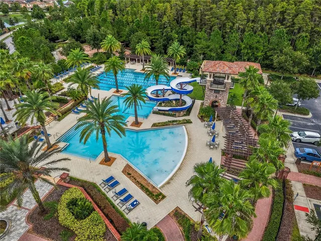 an aerial view of a house with a garden