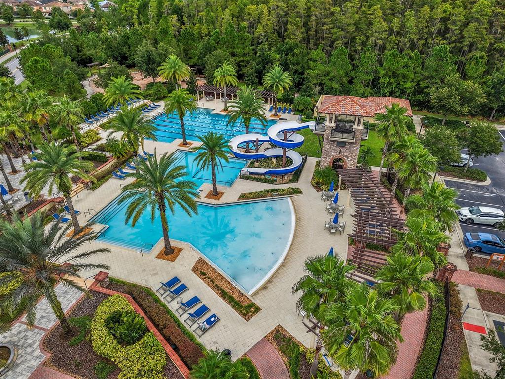 4663 Almada Lane Wesley Chapel, FL 33543 - Photo 23 of 30 an aerial view of a house with a garden