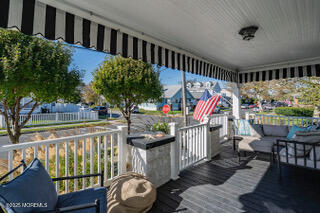 220 13th Avenue Belmar, NJ 07719 - Photo 18 of 21 a view of a balcony with outdoor seating