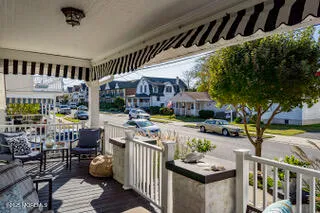 a view of a chairs and tables in the patio
