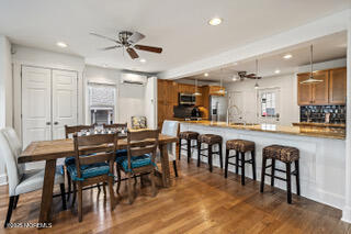 220 13th Avenue Belmar, NJ 07719 - Photo 5 of 21 a view of a dining area with furniture and chandelier