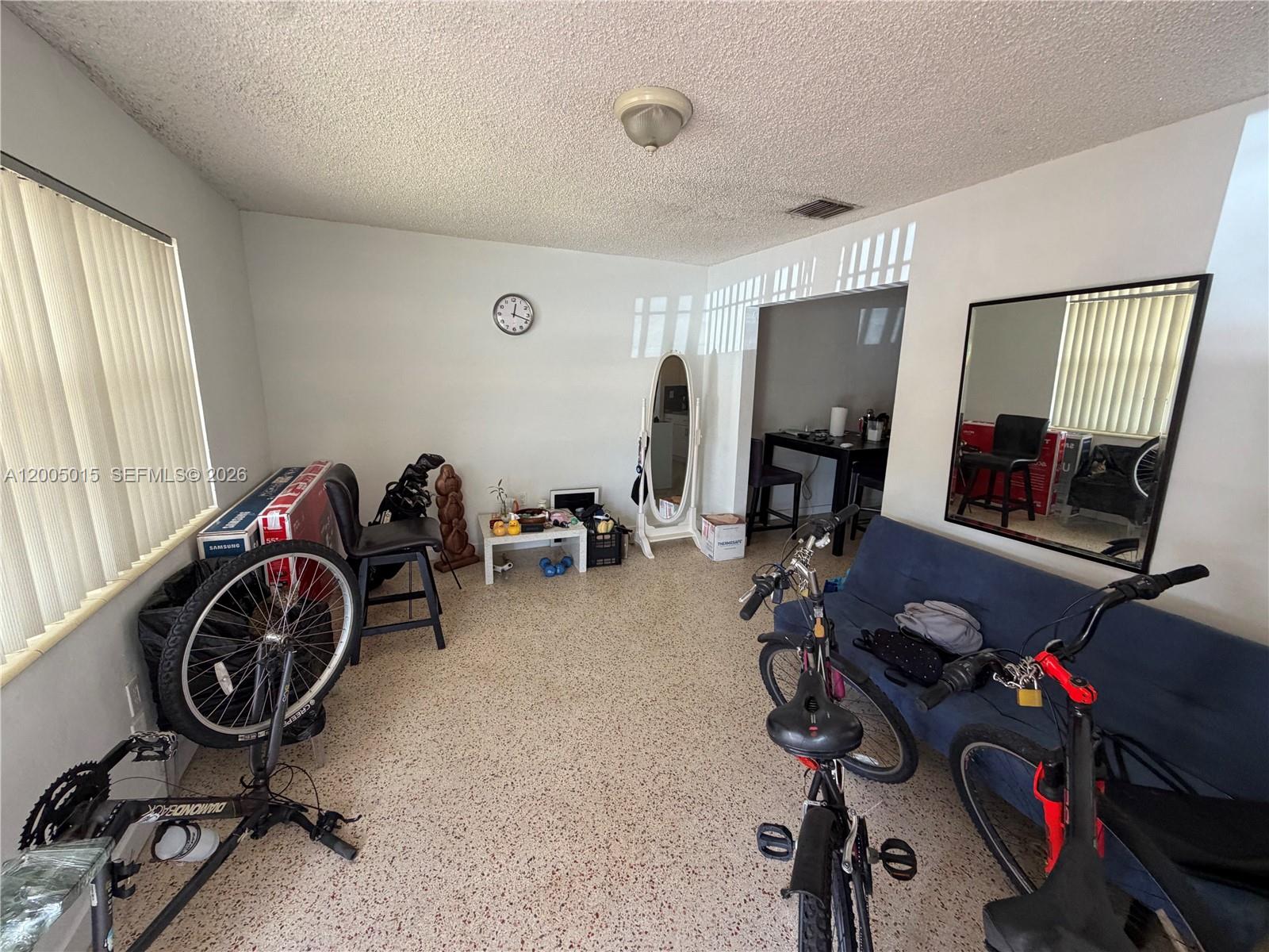 3361 Southwest 28th Street Miami, FL 33133 - Photo 2 of 17 a view of a room with gym equipment