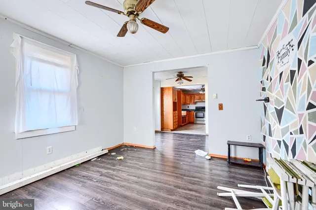 a view of an entryway with wooden floor