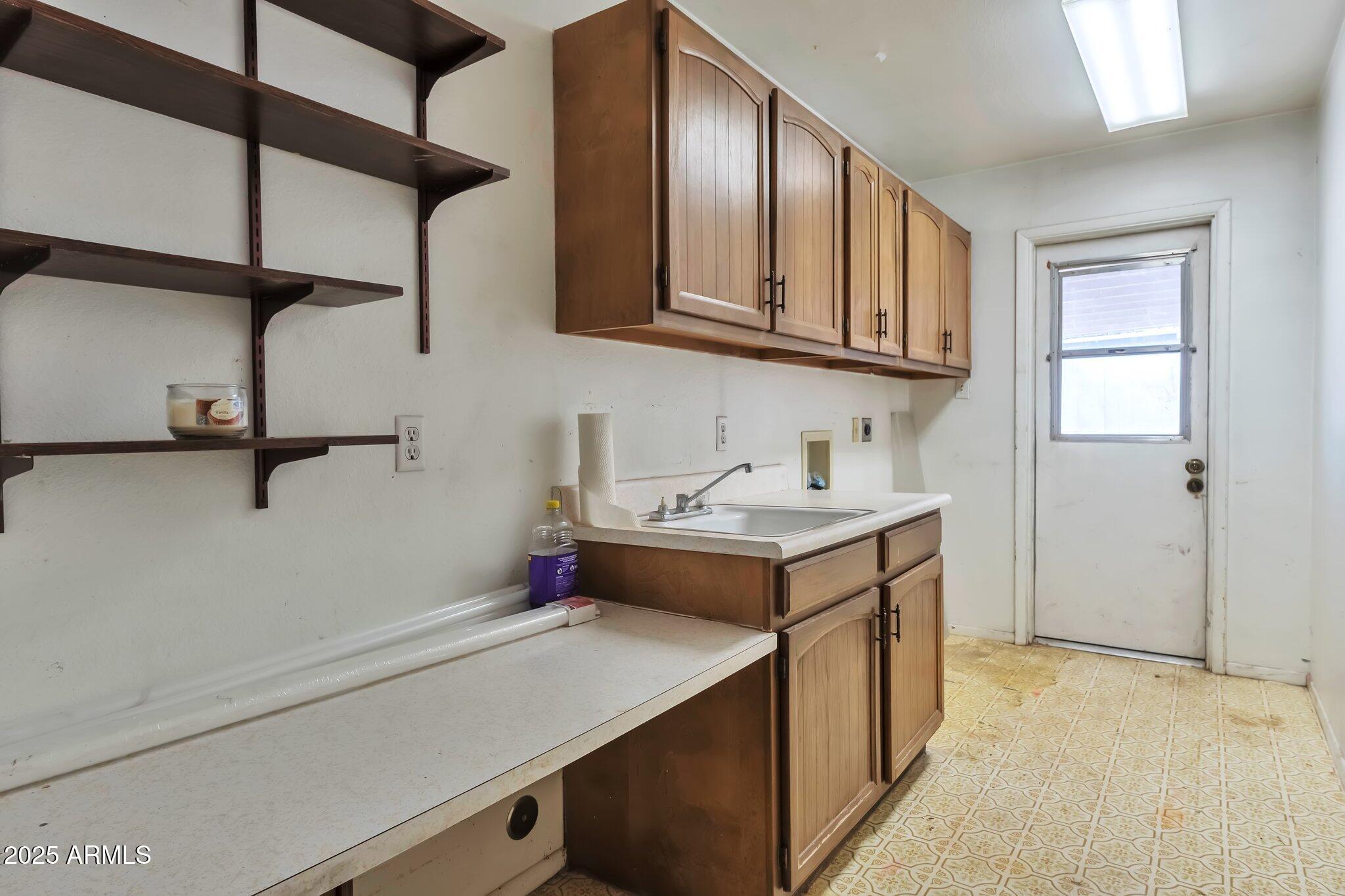 504 North Emerson Mesa, AZ 85201 - Photo 11 of 19 a utility room with cabinets